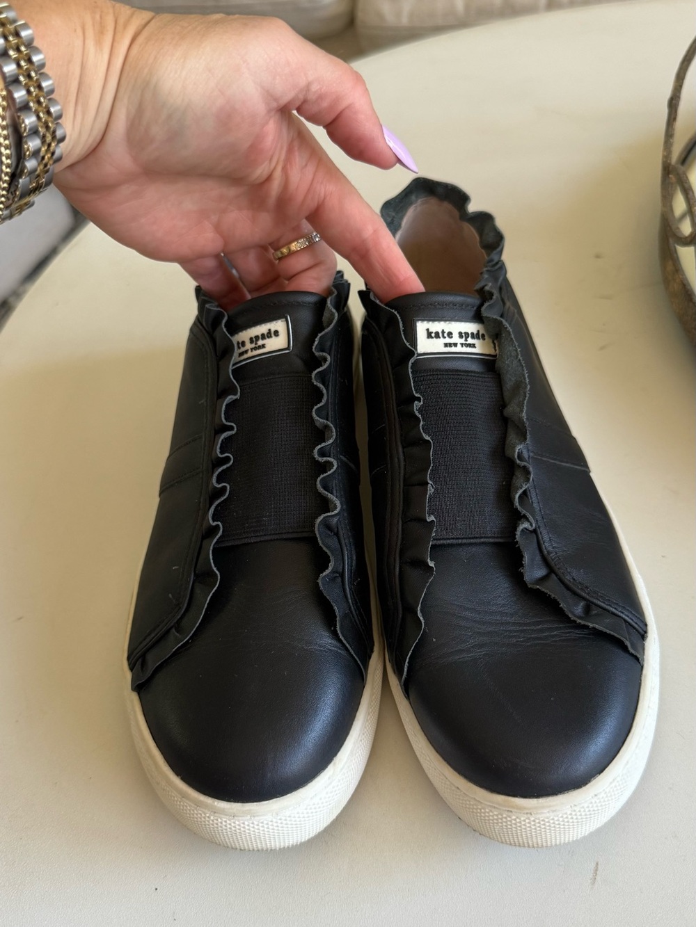 kate spade Black Ruffle-Trim Slip On Sneakers